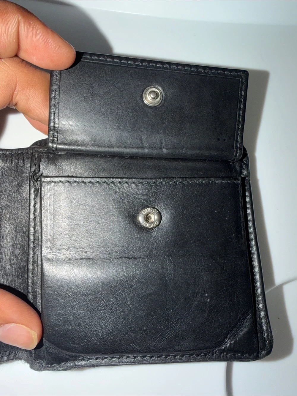 Gucci Black Embossed Interlocking G Leather Bi-Fold Wallet